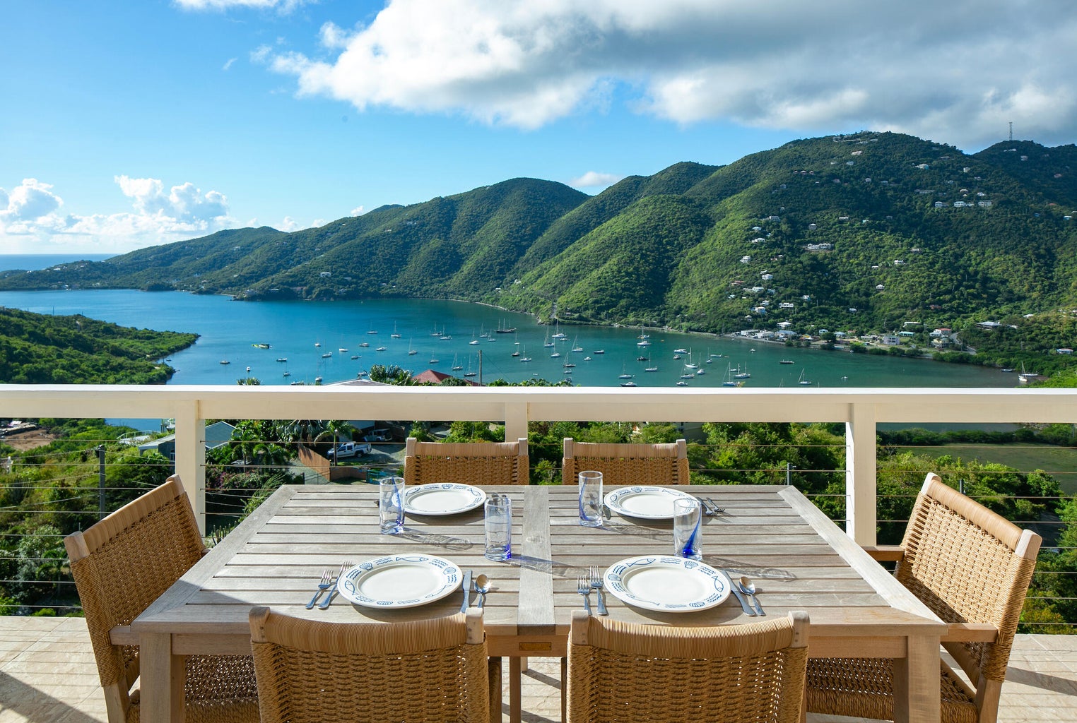 Outdoor dining terrace overlooking Coral Bay